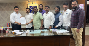 Who helped Valmik Karad to live in Pune ?