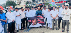 congress protests babanrao lonikar insulting remarks on farmers